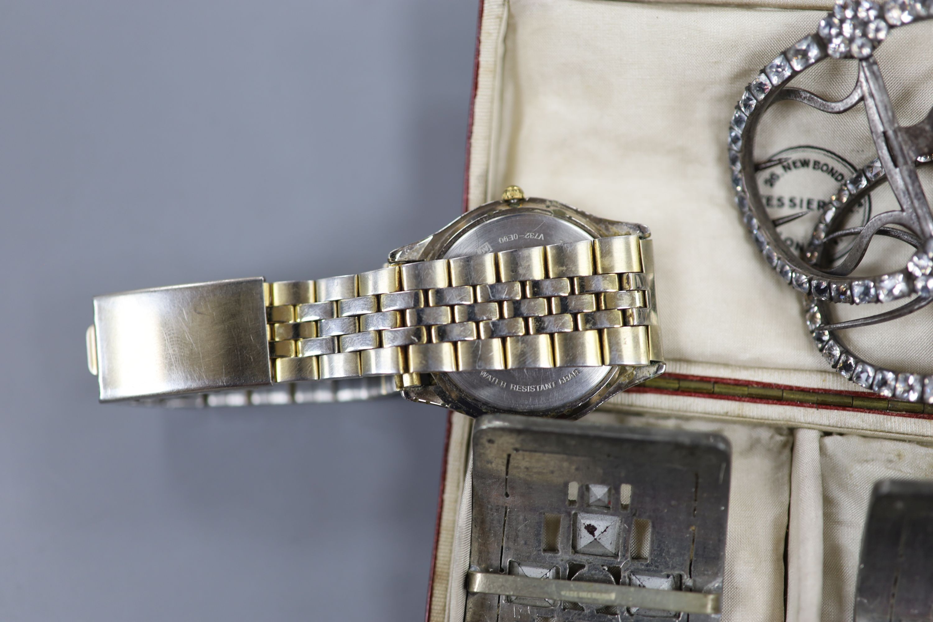 A pair of steel and paste set shoe buckles, one other pair, a cased set of three opal set dress studs and a Pulsar watch.